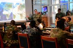 (Feb. 13, 2025) – Information Systems Technician 2nd Class Chris Sagarino, a maritime domain analyst assigned to Navy Reserve U.S. Sixth Fleet Naval Cooperation and Guidance for Shipping (NCAGS), gives a brief on area of operations observations to partner nations Feb. 13, 2025, during Exercise Cutlass Express 2025 (CE 25) in the Regional Coordination Operations Center in Victoria, Seychelles.