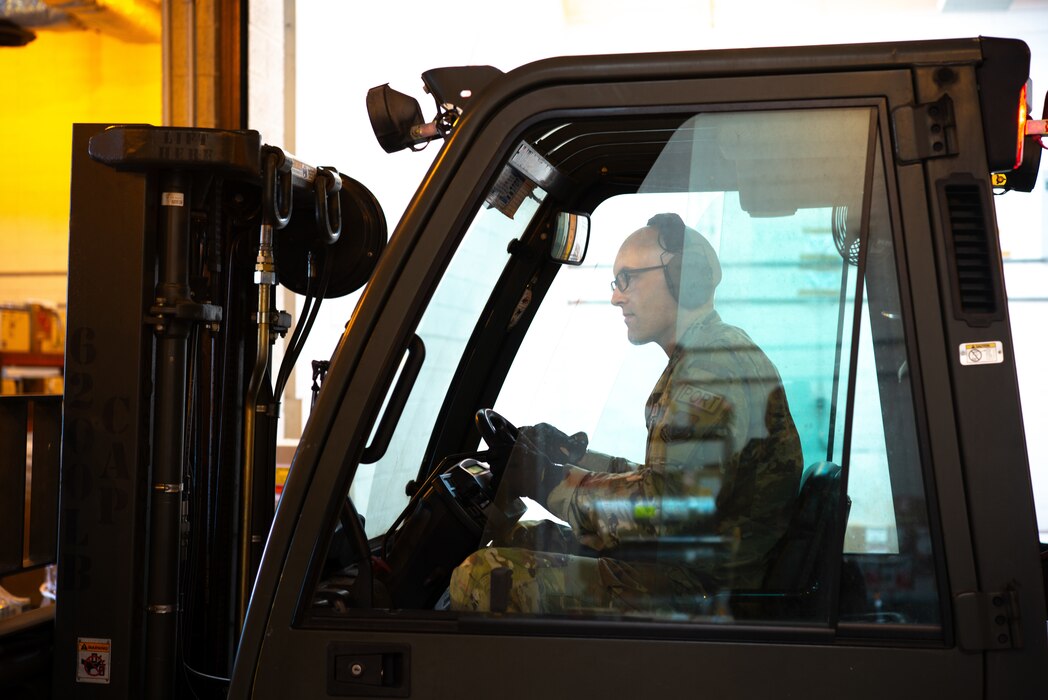 Tech. Sgt. Duncan Hamlin, a loadmaster with the 86th Aerial Port Squadron, poses for a photo on Dec. 12, 2024, at Travis Air Force Base, California. The 86th APS is responsible for global airlift operations.