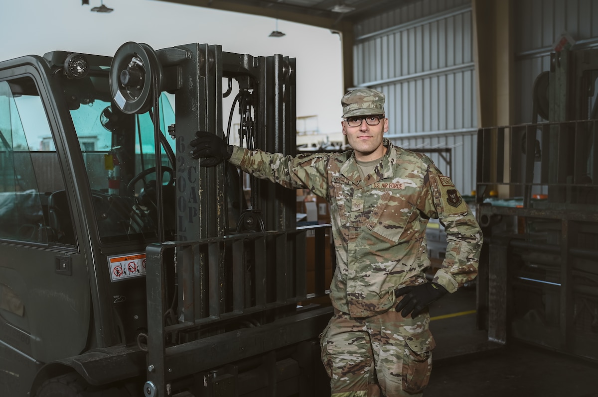 Tech. Sgt. Duncan Hamlin, a loadmaster with the 86th Aerial Port Squadron, poses for a photo on Dec. 12, 2024, at Travis Air Force Base, California. The 86th APS is responsible for global airlift operations.