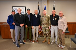 A group of people pose for a photo.
