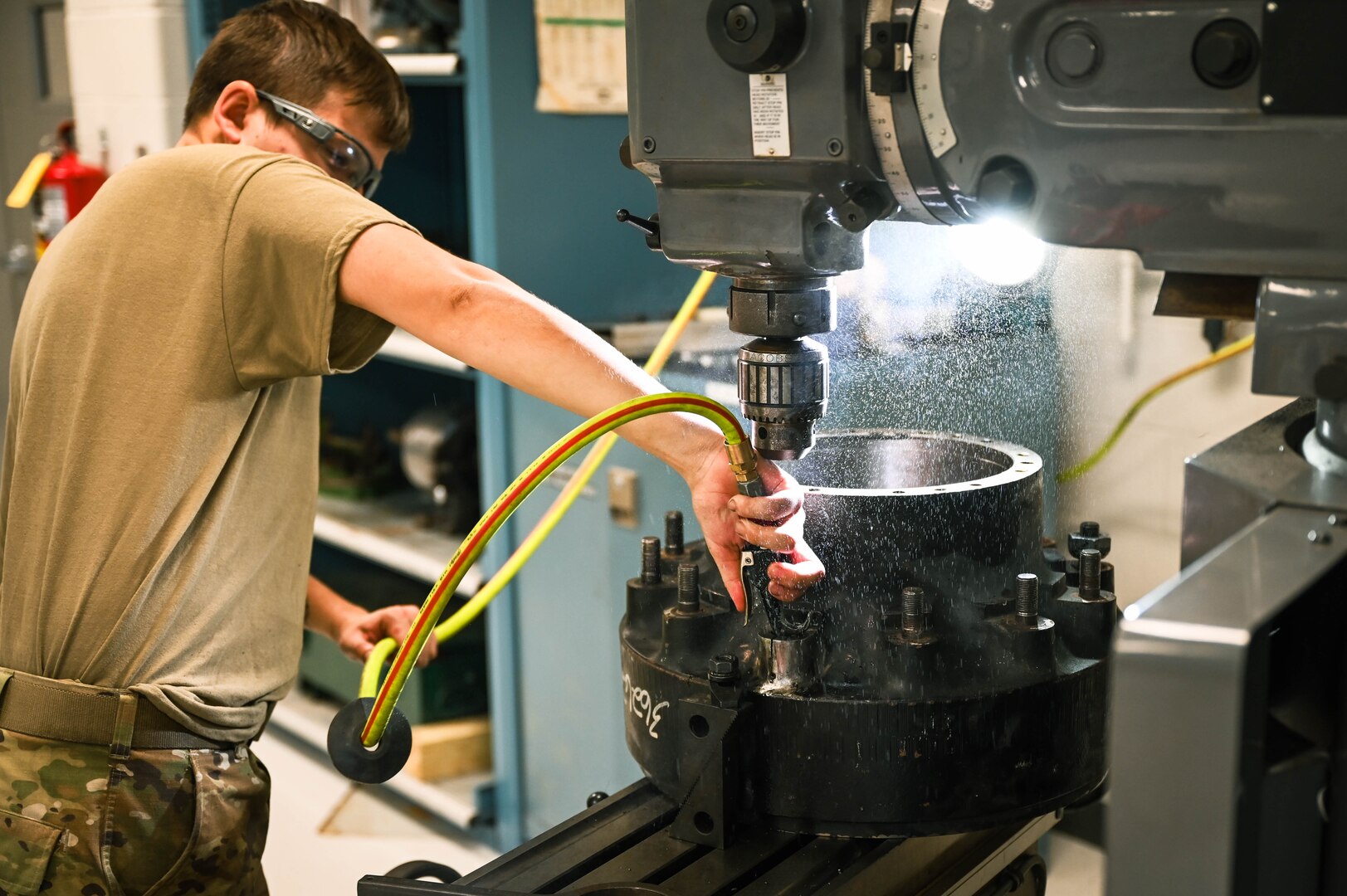 Staff Sgt. Daniel Katona, an aircraft metals technologist with the 155th Air Refueling Wing, works on a cracked lug area on a wheel hub, Dec. 20, 2024, at the Nebraska National Guard air base in Lincoln, Nebraska. Facing a costly $75,000 equipment failure, the 155th Air Refueling Wing’s metals technology team used skill, innovation and teamwork to restore a critical aircraft tow vehicle, ensuring mission readiness.