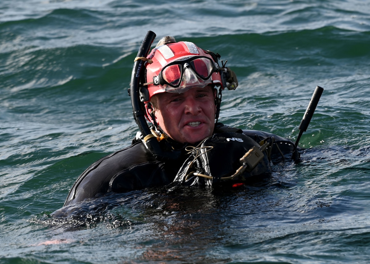 A U.S. Airman assigned to the 38th Rescue Squadron swims to isolated personnel for extraction during Exercise Bamboo Eagle 25-1, in the San Diego Bay, California, Feb. 14, 2025. BE demonstrated the U.S. Air Force’s ability to operate in a contested, dynamic environment against high-end threats on short notice. (U.S. Air Force photo by Staff Sgt. Abbey Rieves)