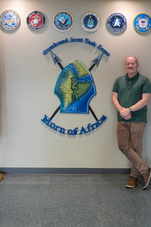 U.S. Army Capt. Matthew L. Gotzy, currently filling an East Africa Response Force planner position, was recently selected as the Junior Officer of the Month by Maj. Gen. Brian Cashman, commander, Combined Joint Task Force-Horn of Africa. (U.S. Army National Guard courtesy photo)