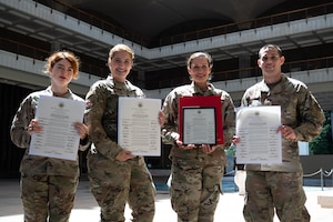 Members of the 624th Aeromedical Staging Squadron receive the Impact Award at the Hawaii State Capitol, March 7, 2025