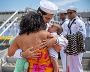 Joint Base Pearl Harbor-Hickam, Hawaii, March 16, 2025. Machinist's Mate, Nuclear Power, 2nd Class Chris Gailiatabarez greets his family after the Virginia-class fast-attack submarine USS Vermont (SSN 792) returned to Joint Base Pearl Harbor-Hickam, Hawaii following a scheduled deployment, March 16, 2025. Vermont is the third U.S. Navy ship named after the Green Mountain State.