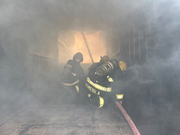 U.S. Army Garrison firefighters extinguish flames after a controlled burn exercise at Torii Station, Okinawa, Japan, March 17, 2025.