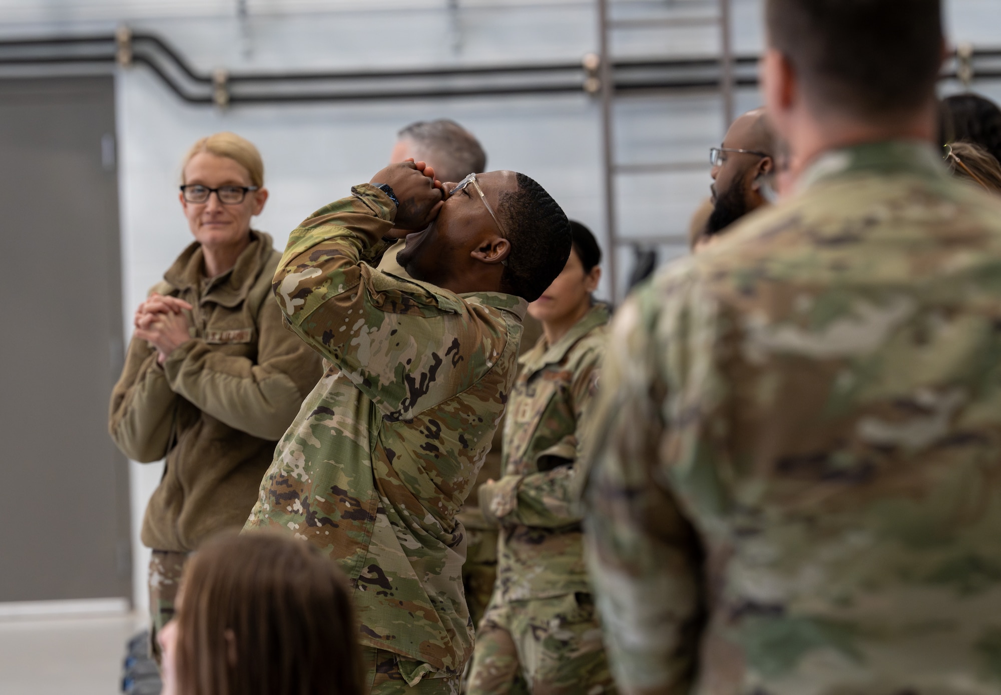A U.S. Airman announces the start of an annual load crew competition