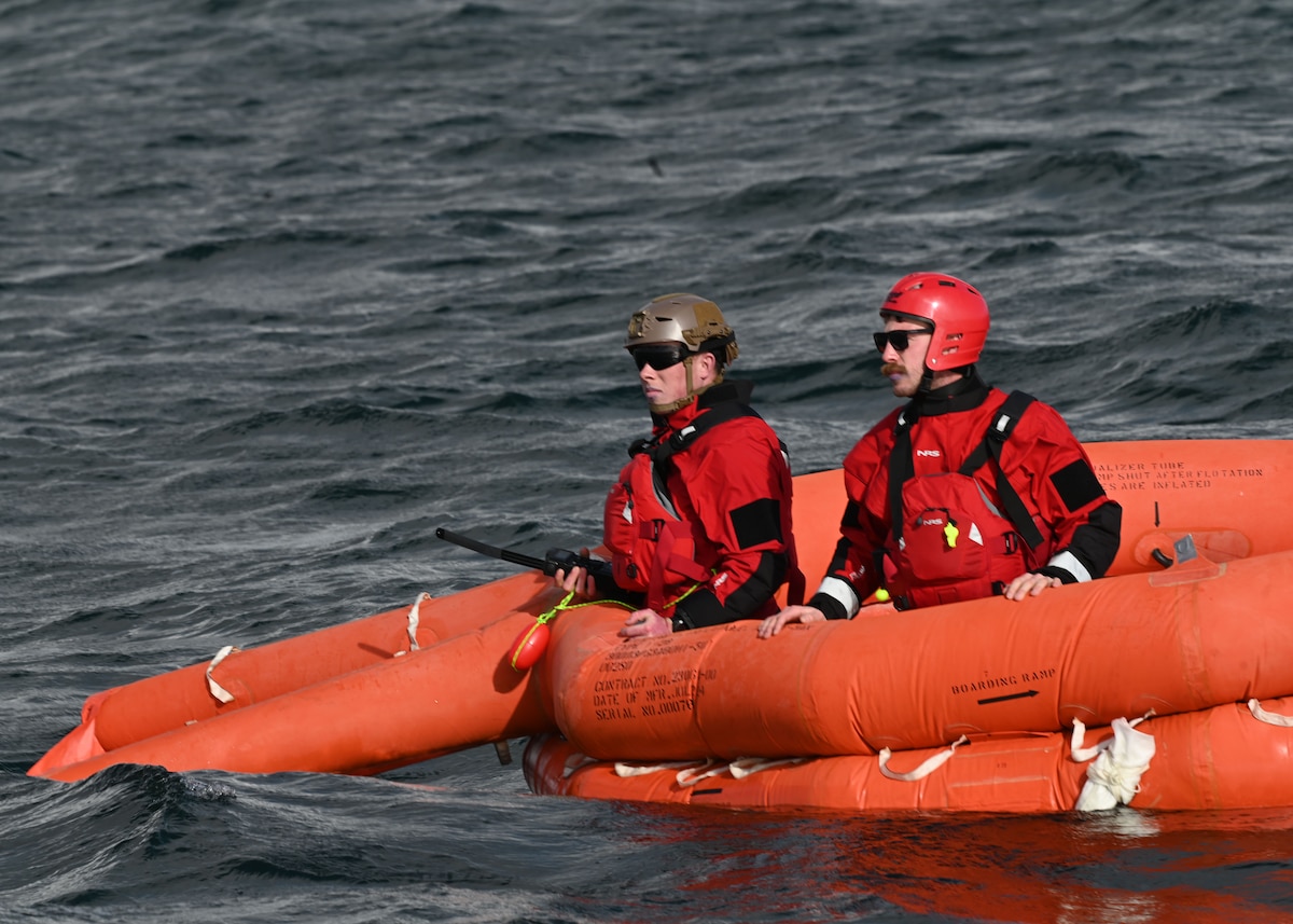 U.S. Airmen stationed at Fairchild Air Force Base, Washington, wait for extraction during Exercise Bamboo Eagle 25-1, in San Diego Bay, California, on Feb. 14, 2025. The 414th Combat Training Squadron Detachment 1 designed the scenario to train against the toughest threats the force might face, with readiness and the goal of continuous improvement as an everyday priority. (U.S. Air Force photo by Staff Sgt. Abbey Rieves)