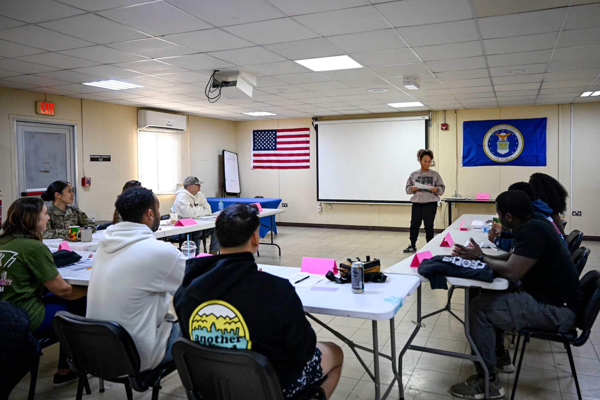 A teacher speaks in a class.