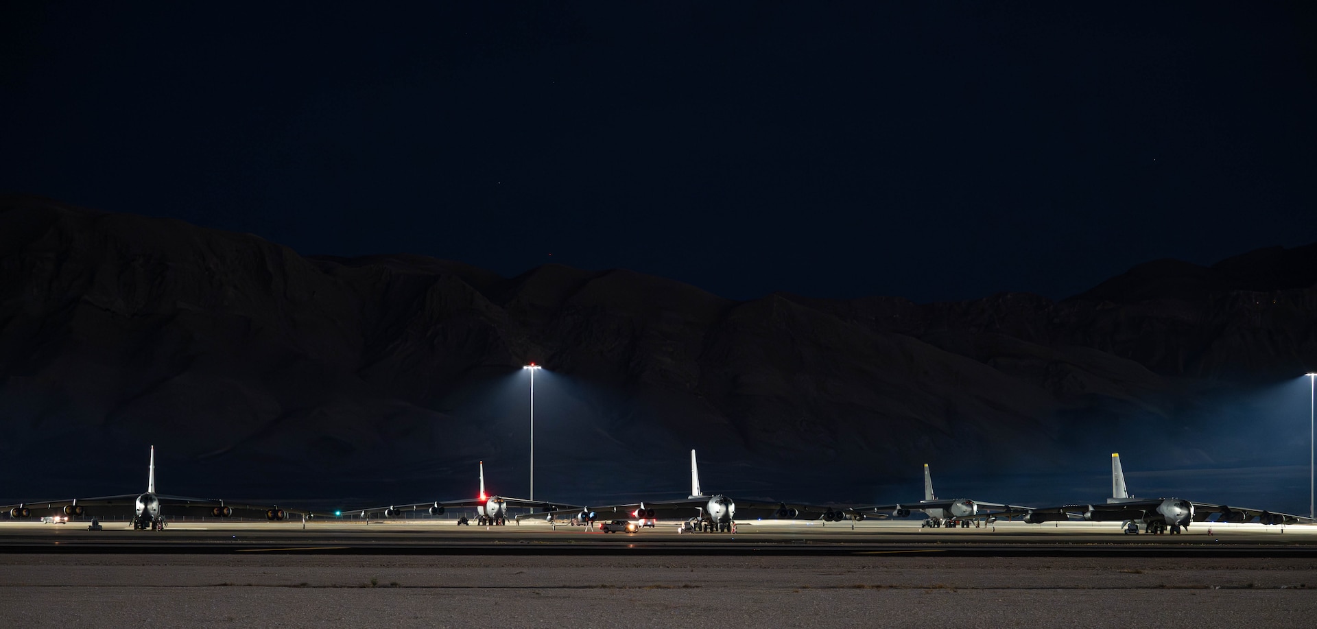 U.S. Air Force B-52H Stratofortresses assigned to the 23rd Bomb Squadron sit on the flightline during Red Flag 25-2 at Nellis Air Force Base, Nevada, March 11, 2025. Red Flag gives mission commanders the opportunity to lead forces in realistic combat scenarios in contested, degraded, and operationally limited environments to prepare and train them for future conflicts. (U.S. Air Force photo by Senior Airman Kyle Wilson)