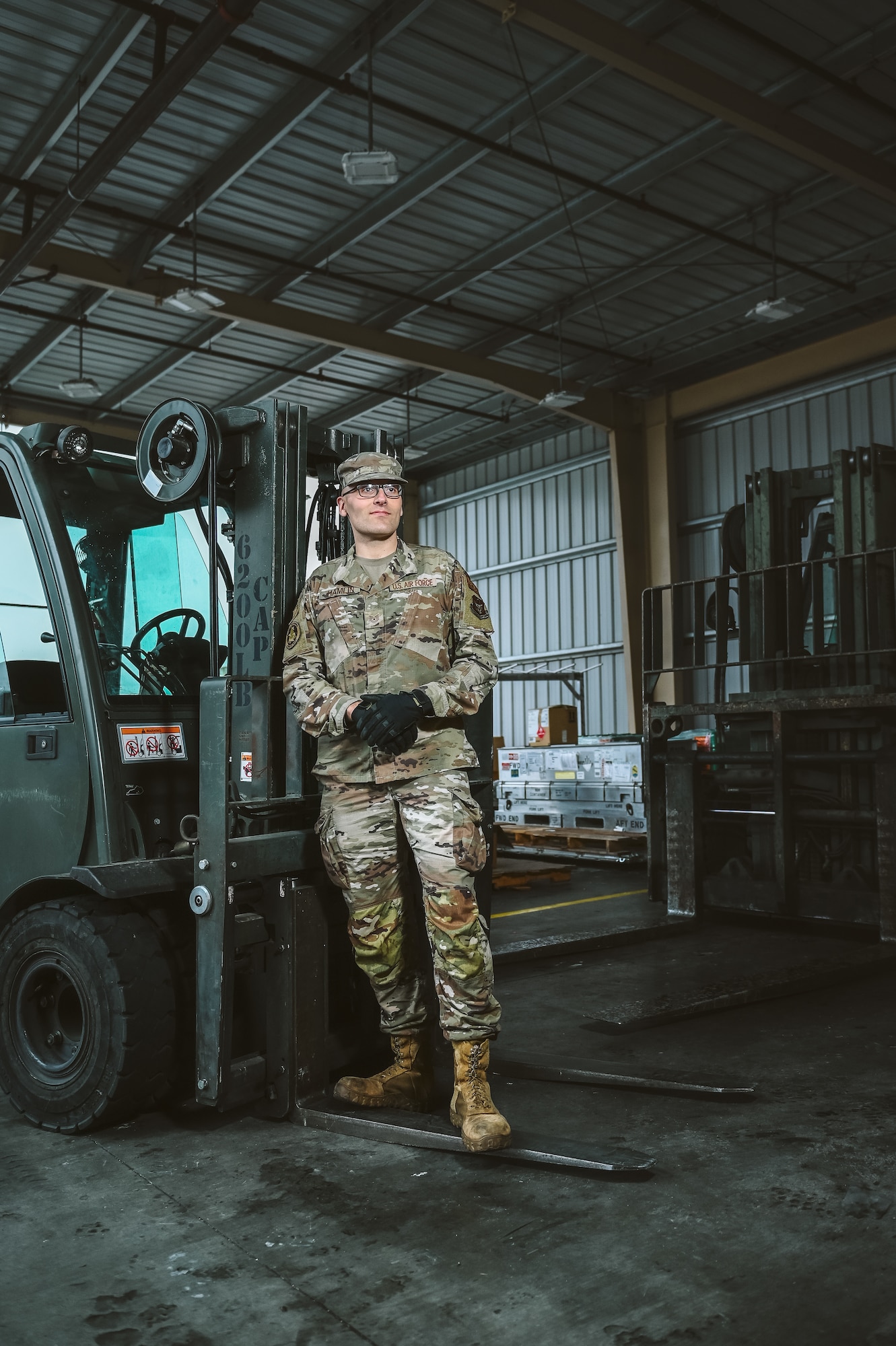 Tech. Sgt. Duncan Hamlin, a loadmaster with the 86th Aerial Port Squadron, poses for a photo on Dec. 12, 2024, at Travis Air Force Base, California. The 86th APS is responsible for global airlift operations.