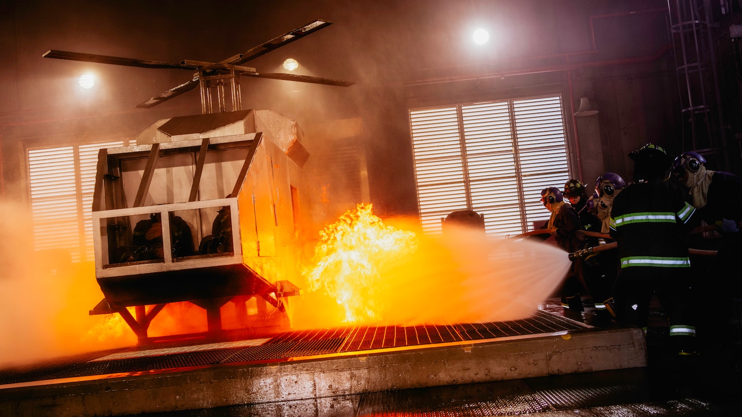 Sailors assigned to Nimitz-class aircraft carrier USS George Washington (CVN 73) combat a fire during an aircraft firefighting class at Surface Warfare School Command (SWSC) on Commander, Fleet Activities Yokosuka, March 14, 2025.
