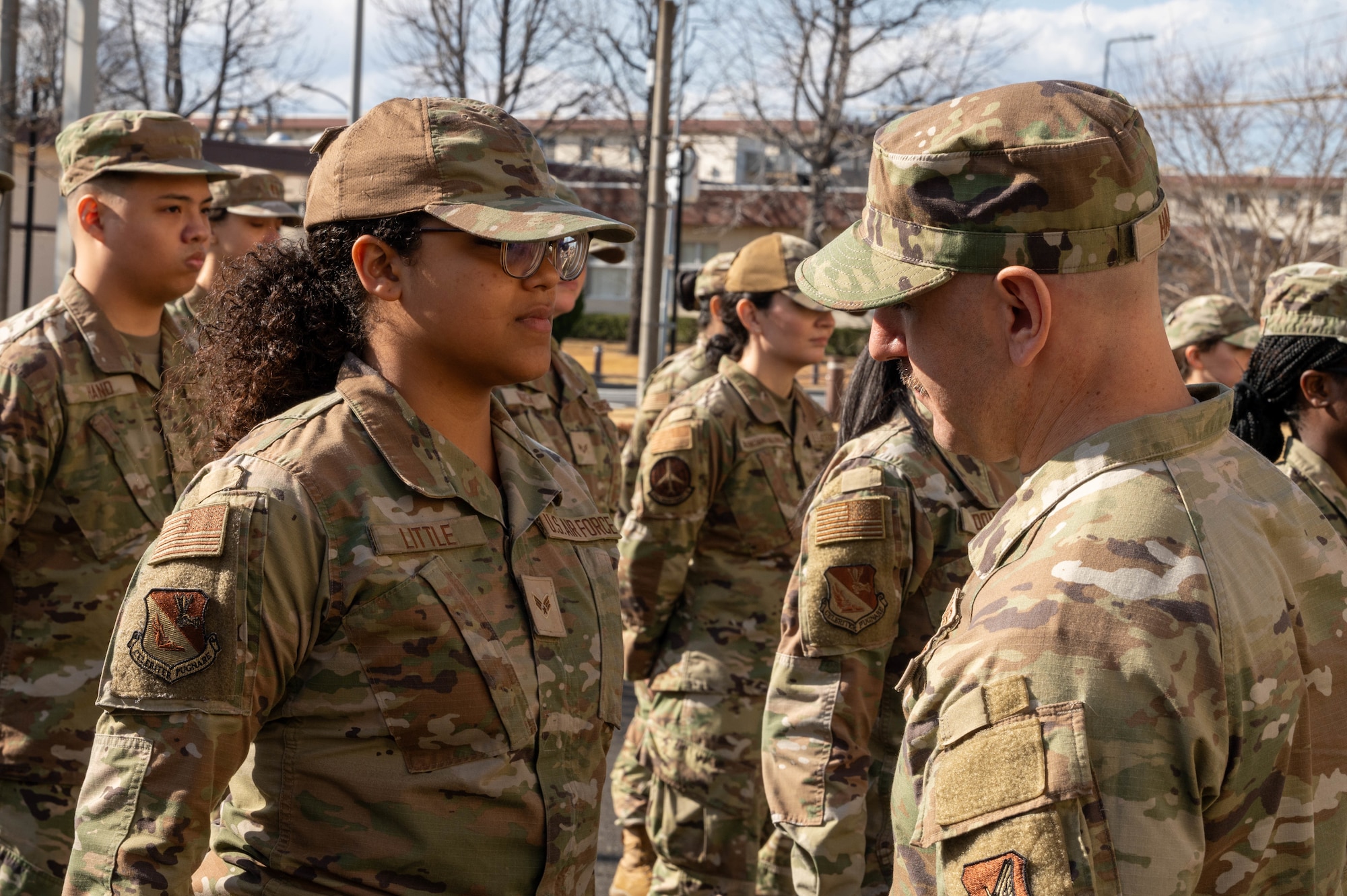 374th Airlift Wing command chief inspects Airmen’s uniforms.