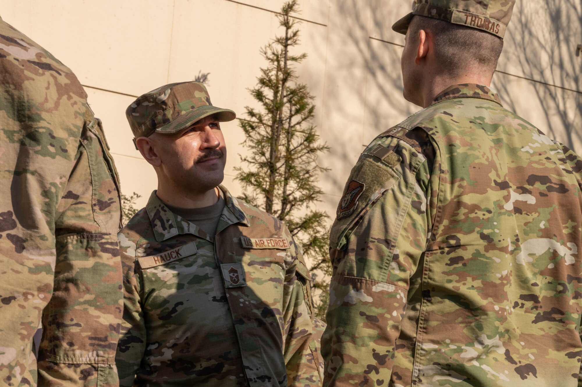 374th Airlift Wing command chief inspects Airmen’s uniforms.