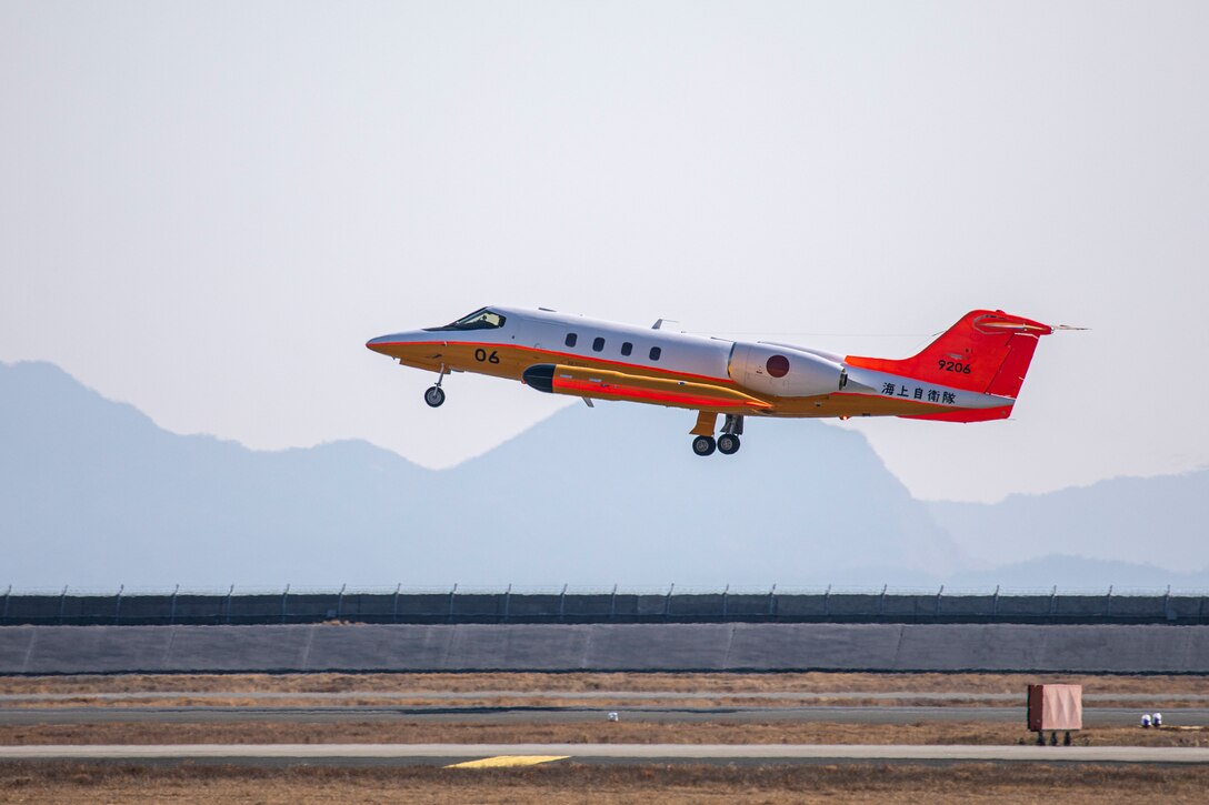 A U-36A aircraft with the Japan Maritime Self-Defense Force takes off during the U-36A aircraft retirement ceremony at Marine Corps Air Station Iwakuni, Japan, March 10, 2025. Based on the Learjet 36A, the U-36A is a training support aircraft capable of electronic jamming and target towing and has been used by the JMSDF since 1987. (U.S. Marine Corps photo by Cpl. Dahkareo Pritchett)