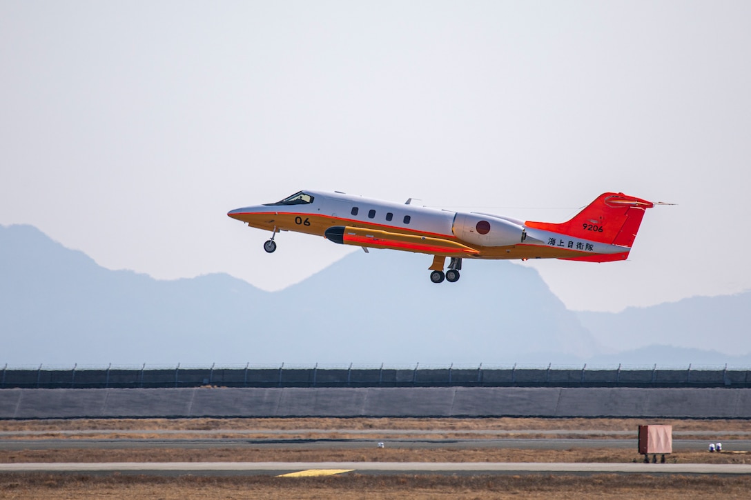 A U-36A aircraft with the Japan Maritime Self-Defense Force takes off during the U-36A aircraft retirement ceremony at Marine Corps Air Station Iwakuni, Japan, March 10, 2025. Based on the Learjet 36A, the U-36A is a training support aircraft capable of electronic jamming and target towing and has been used by the JMSDF since 1987. (U.S. Marine Corps photo by Cpl. Dahkareo Pritchett)