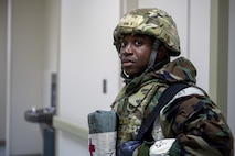 A U.S. Air Force Airman prepare for a medical evacuation during the Beverly Sunrise 25-03 exercise at Misawa Air Base, Japan, March 17, 2025. This scenario tested the ability of medical personnel to rapidly respond, coordinate patient transport, and provide critical care in a simulated contingency scenario, ensuring readiness for real-world emergencies. (U.S. Air Force photo by Senior Airman William Rodriguez)