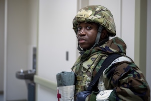 A U.S. Air Force Airman prepare for a medical evacuation during the Beverly Sunrise 25-03 exercise at Misawa Air Base, Japan, March 17, 2025. This scenario tested the ability of medical personnel to rapidly respond, coordinate patient transport, and provide critical care in a simulated contingency scenario, ensuring readiness for real-world emergencies. (U.S. Air Force photo by Senior Airman William Rodriguez)