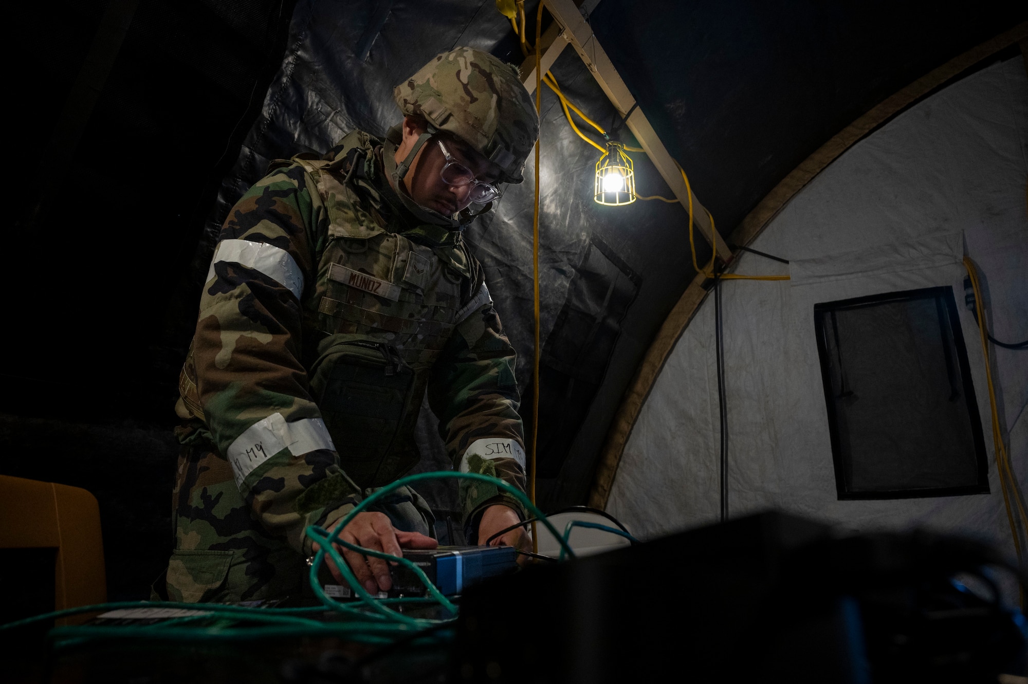 U.S. Air Force Airman 1st Class Glendale Munoz, 35th Fighter Wing Mission Ready Airman (MRA) program participant, packs up a spoke communication framework during the Beverly Sunrise 25-03 exercise at Misawa Air Base, Japan, March 18, 2025.