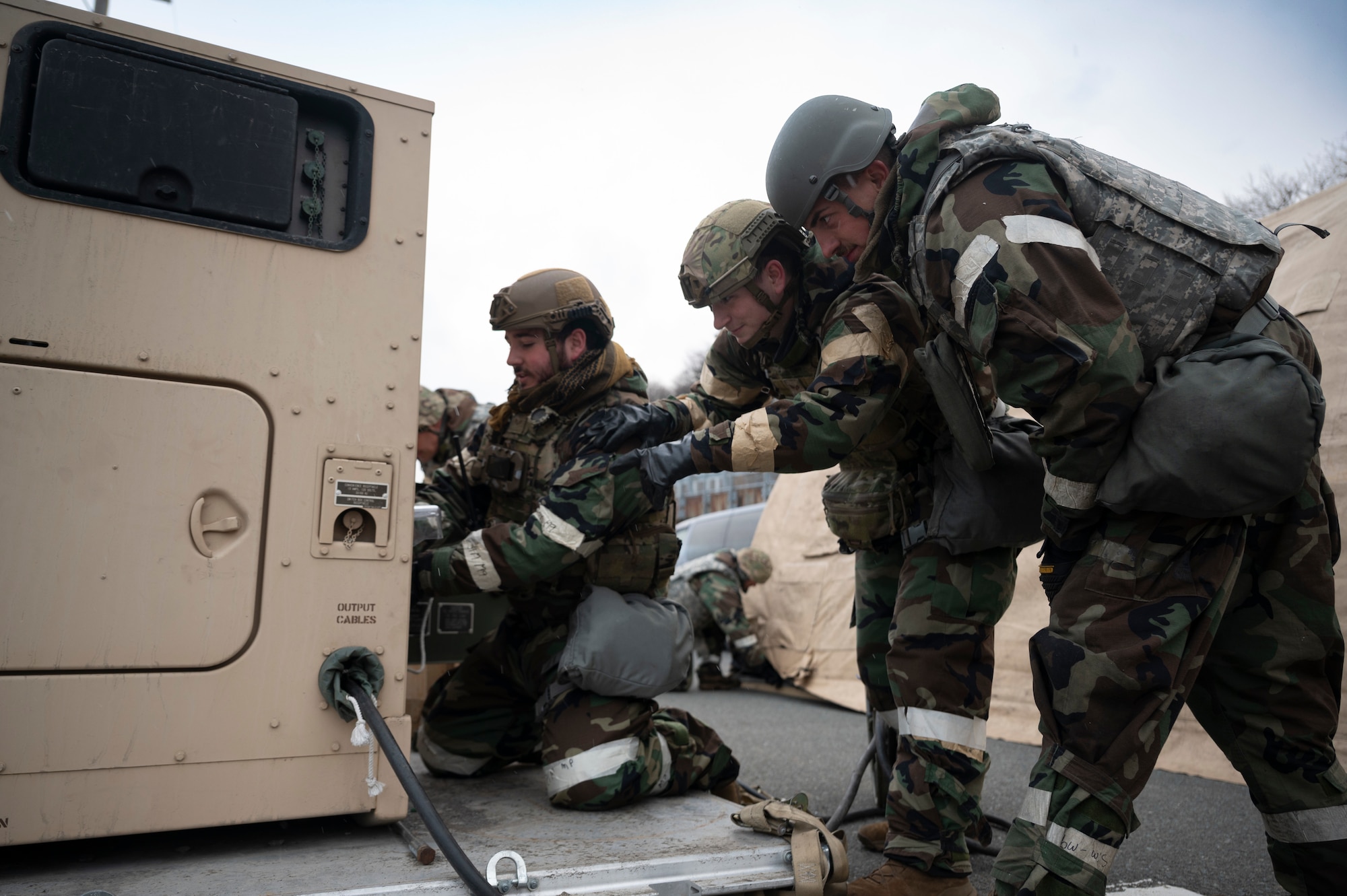 U.S. Air Force Mission Ready Airmen (MRA) assigned to the 35th Fighter Wing inspect a generator during a spoke teardown as part of the Beverly Sunrise 25-03 exercise at Misawa Air Base, Japan, March 18, 2025.