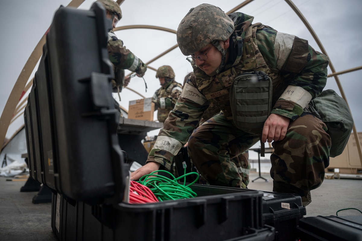 U.S. Air Force Senior Airman Jack Miesse, 35th Fighter Wing Mission Ready Airman (MRA) program participant, packs up a spoke communication framework during the Beverly Sunrise 25-03 exercise at Misawa Air Base, Japan, March 18, 2025.