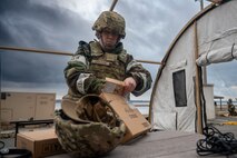 U.S. Air Force Senior Airman Lori Griffith, 35th Fighter Wing Mission Ready Airman (MRA) program participant, packs up a spoke communication framework during the Beverly Sunrise 25-03 exercise at Misawa Air Base, Japan, March 18, 2025.
