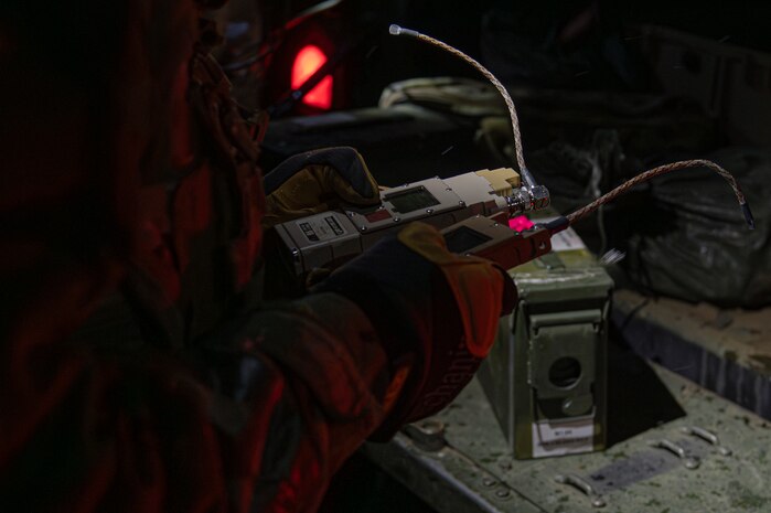 A U.S. Air Force Airman assigned to the 35th Civil Engineer Squadron explosive ordnance disposal flight prepares detonation equipment to neutralize a simulated drone during Beverly Sunrise 25-03 at Misawa Air Base, Japan, March 18, 2025. Continuous exercises like Beverly Sunrise sharpen operational effectiveness, reinforcing the 35th Fighter Wing’s combat superiority and readiness to respond to any threat. (U.S. Air Force photo by Senior Airman Brittany Russell)