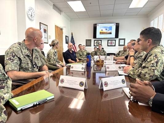 GUANTANAMO BAY, Cuba (Feb. 27, 2025) – Members of the Executive Steering Committee at U.S. Naval Hospital Guantanamo Bay meet with Dr. Stephen Ferrara, Acting Assistant Secretary of Defense for Health Affairs, and hospital leadership, including U.S. Navy Capt. Tammy Servies, director of U.S. Naval Hospital Guantanamo Bay, commanding officer of U.S. Navy Medicine Readiness and Training Command Guantanamo Bay, and commander of the Joint Medical Group, Joint Task Force Guantanamo Bay. The meeting provided an opportunity to brief Ferrara and his delegation on the hospital’s mission, capabilities, and operational footprint. (U.S. Navy photo by Emily McCamy)