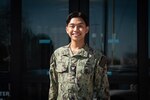 Hospital Corpsman Third Class Marc Philip Dumayag supports families and uplifts staff members as a General Duty Corpsman at Naval Health Clinic Cherry Point, aiming to leverage his experience as a Corpsman to become a pediatrician.