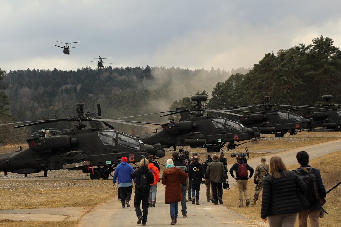Escorting Press during media day through an aviation area of operations