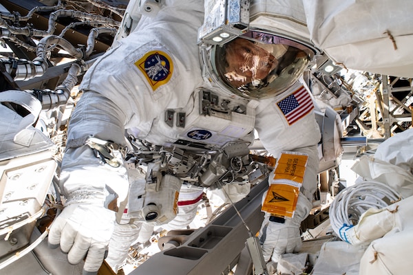 NASA astronaut and Space Force Col. Nick Hague conducts a spacewalk.