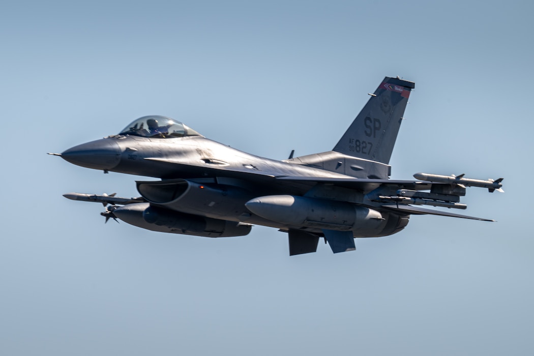 AN F-16 Fighting Falcon conducts a fly-by.