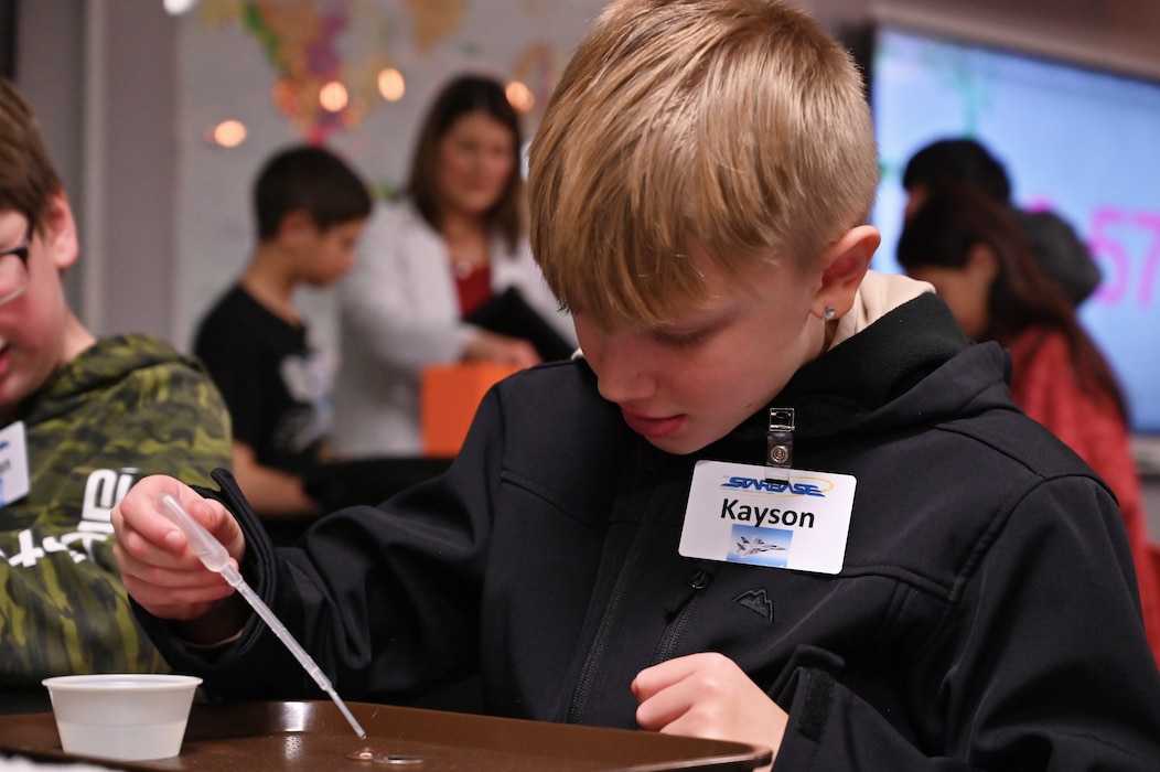 Student uses a pipet