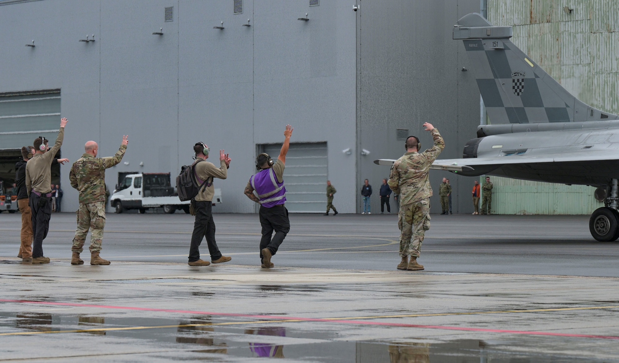 men waving