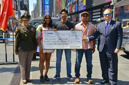 New York, N.Y. – Maj. Gen. Kris A. Belanger, commander of the 99th Readiness Division (left), and Ronald “Ron” Shindel, a Civilian Aide to the Secretary of the Army (NY South), present a U.S. Army Minuteman Scholarship to Zachary Seepersaud, during a 249th U.S. Army Birthday event here on June 14, 2024. The event was hosted by the U.S. Army New York City Recruiting Battalion to celebrate the contributions of Soldiers who’ve served the nation and strengthen relationships with community partners.
(U.S. Army Photo By: Sgt 1st Gregory Williams/Released)