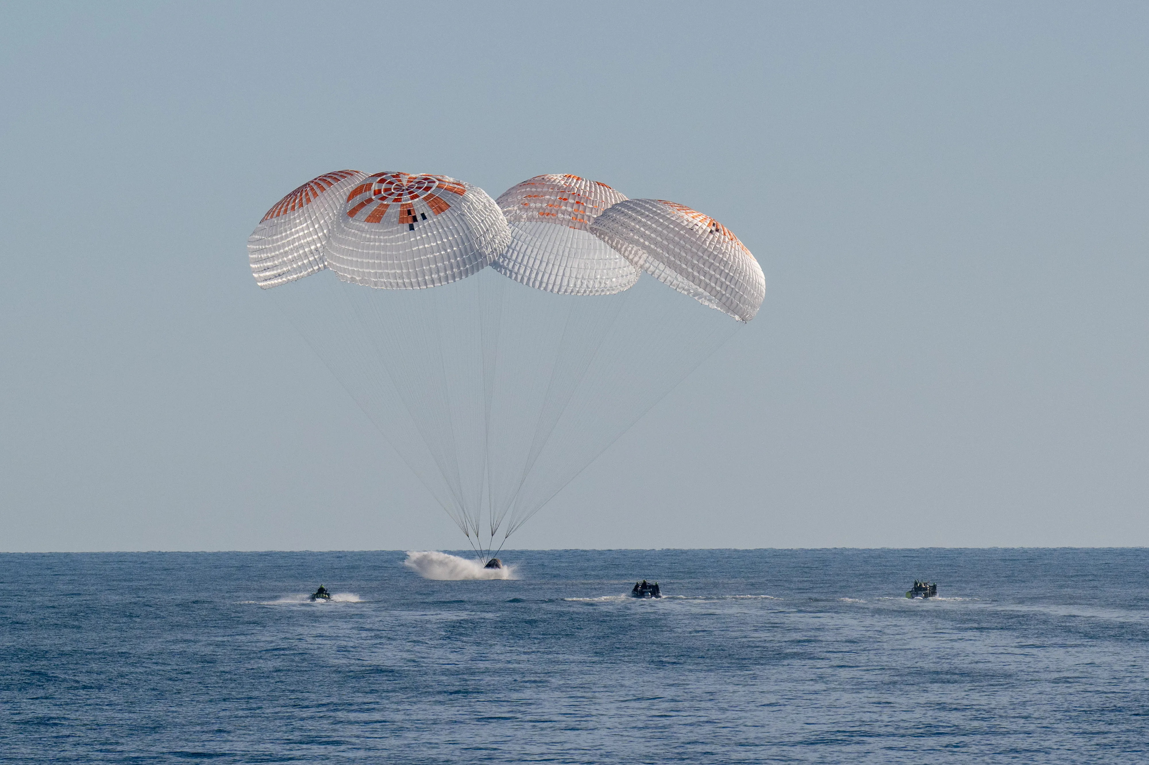 NASA astronaut and Space Force Col. Nick Hague, fellow SpaceX Crew-9 members astronauts Suni Williams and Butch Wilmore – both retired Navy captains, and Roscosmos cosmonaut Aleksandr Gorbunov land in a SpaceX Dragon spacecraft in the water off the coast of Tallahassee, Fla., March 18, 2025. Hague’s flight marked a significant moment in the history of the Space Force, as he became the first active-duty Guardian to fly to space and one of the first humans to launch from Space Launch Complex 40 at Cape Canaveral Space Force Station, Fla. He traveled 72,553,920 miles during his mission, spent 171 days in space, and completed 2,736 orbits around Earth. Hague has logged 374 days in space over his two missions. (U.S. Air Force photo courtesy of NASA by Keegan Barber)