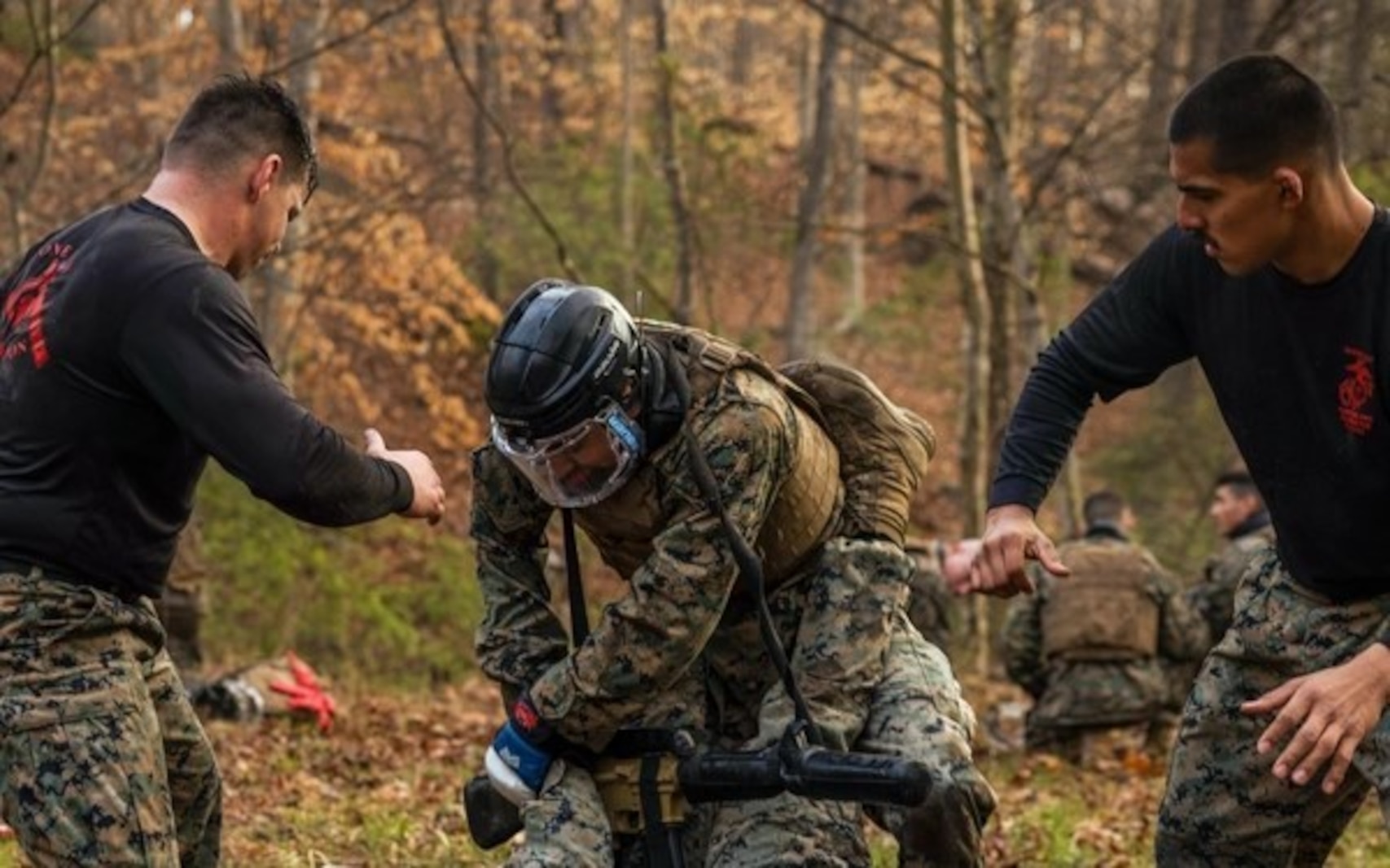 U.S. Marines with Martial Arts Instructor Trainer Course 1-24 spar during training at The Basic School on Marine Corps Base Quantico, Virginia, March, 29, 2024. The exercise consisted of sparring, casualty evacuation, and oleoresin capsicum spray training. (U.S. Marine Corps photo by Lance Cpl. Ethan Miller)