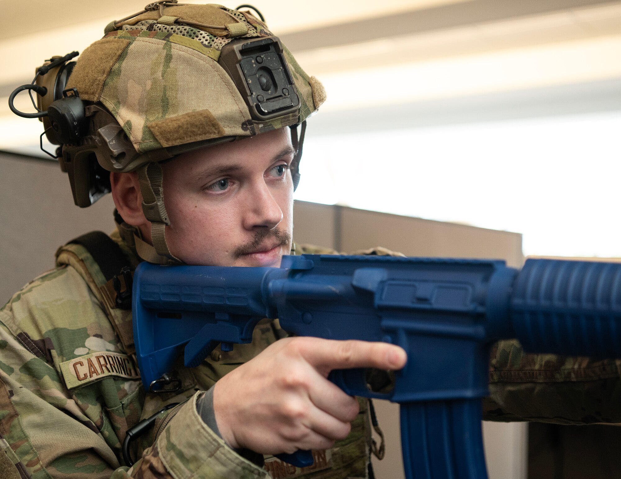U.S. Air Force Airmen from the 133rd Security Forces Squadron search and secure a building during an active shooter exercise in St. Paul, Minn., March 3, 2025.