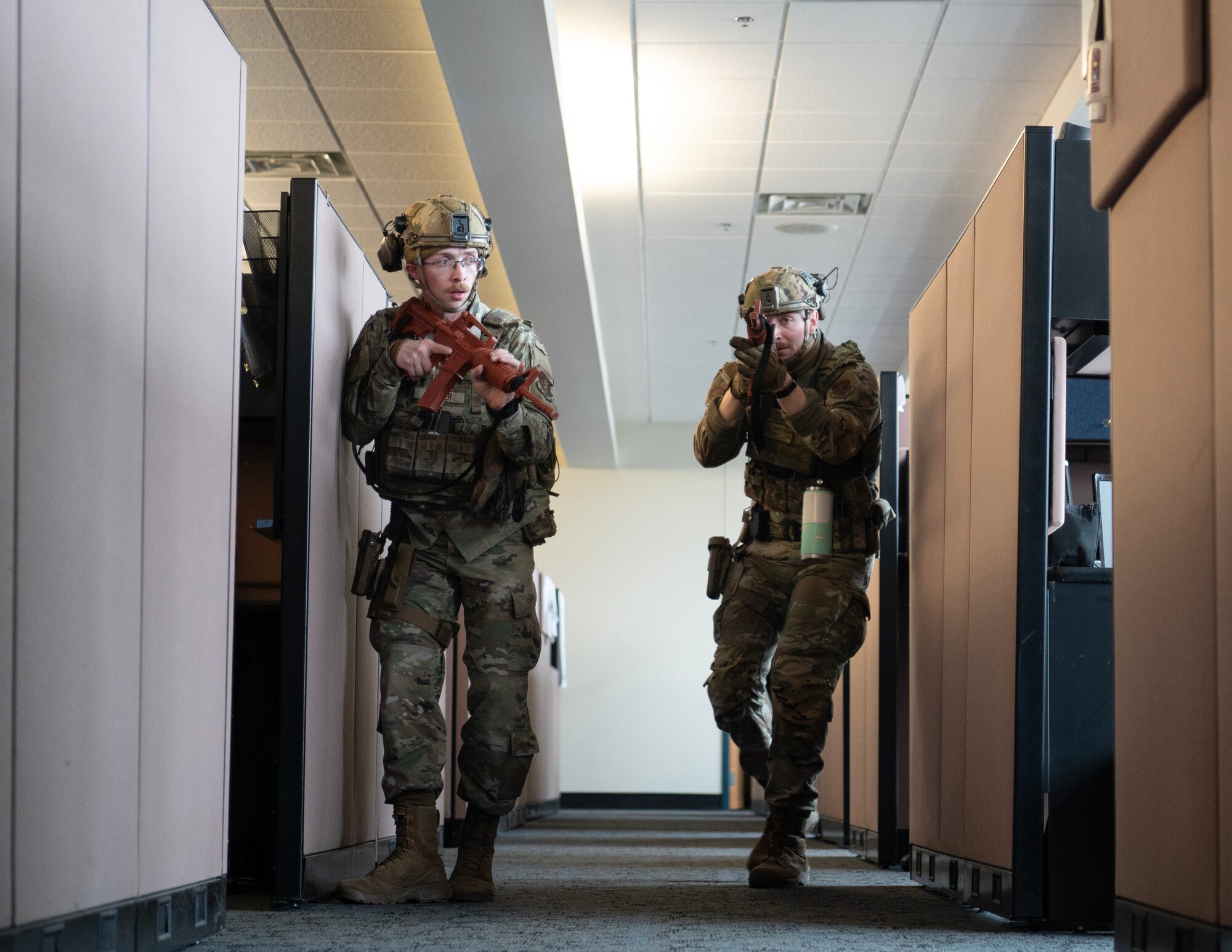 U.S. Air Force Airmen from the 133rd Security Forces Squadron search and secure a building during an active shooter exercise in St. Paul, Minn., March 3, 2025.