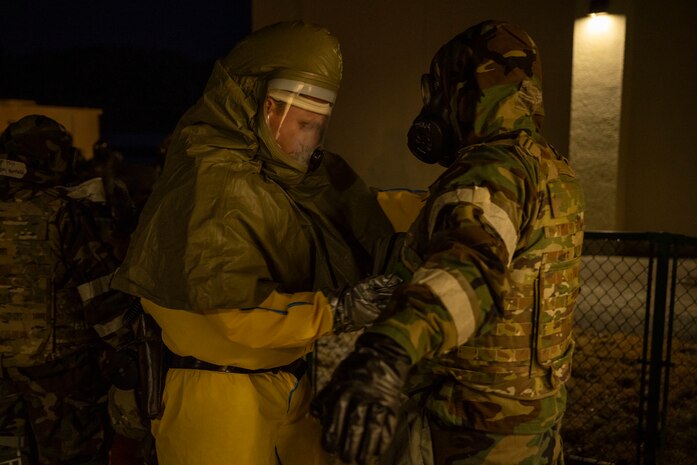 A U.S. Air Force Airman assigned to the 35th Medical Group simulates decontamination procedures during during Beverly Sunrise 25-03.