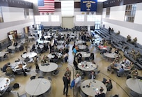 Participants of U.S. Indo-Pacific Command’s Capabilities Development Working Group engage in discussions and meetings on the drill floor of Camp Withycombe’s Armed Forces Readiness Center in Happy Valley, Oregon on March 6, 2025.