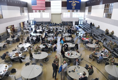 Participants of U.S. Indo-Pacific Command’s Capabilities Development Working Group engage in discussions and meetings on the drill floor of Camp Withycombe’s Armed Forces Readiness Center in Happy Valley, Oregon on March 6, 2025.
