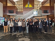 Attendees of the U.S.  Indo-Pacific Command Capabilities Development Working Group 2025 gather for a group photograph at the Camp Withycombe Armed Forces Reserve Center, in Happy Valley, Oregon on March 3, 2025.