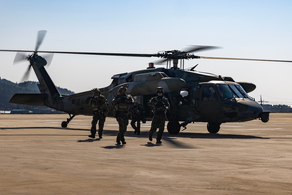 Republic of Korea special operations Soldiers depart a ROK H-60 airframe as a part of a multiday training event associated with exercise Freedom Shield 25 at Paengnyong-Do (Baengyeong-Do), ROK, March 19, 2025.