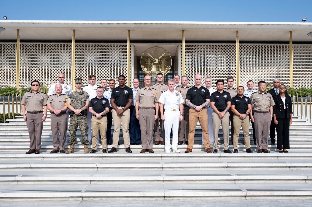 Adm. Samuel J. Paparo, commander of U.S. Indo-Pacific Command, joins personnel assigned to the U.S. Embassy New Delhi for a group photo outside the U.S. Embassy New Delhi, March 17, 2025.
