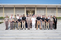 Adm. Samuel J. Paparo, commander of U.S. Indo-Pacific Command, joins personnel assigned to the U.S. Embassy New Delhi for a group photo outside the U.S. Embassy New Delhi, March 17, 2025.