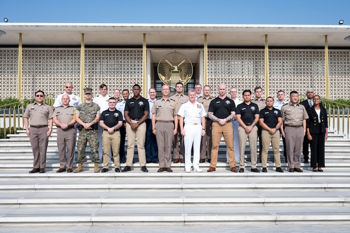 Adm. Samuel J. Paparo, commander of U.S. Indo-Pacific Command, joins personnel assigned to the U.S. Embassy New Delhi for a group photo outside the U.S. Embassy New Delhi, March 17, 2025.