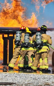 Firefighters from the Florida Air National Guard and the West Virginia Air National Guard trained on an aircraft fire simulator at Gulfport Combat Readiness Training Center in Gulfport, Mississippi, Feb. 23, 2025, during combined emergency response training. The training focused on aircraft and structural firefighting, emergency response tactics and mobility readiness.