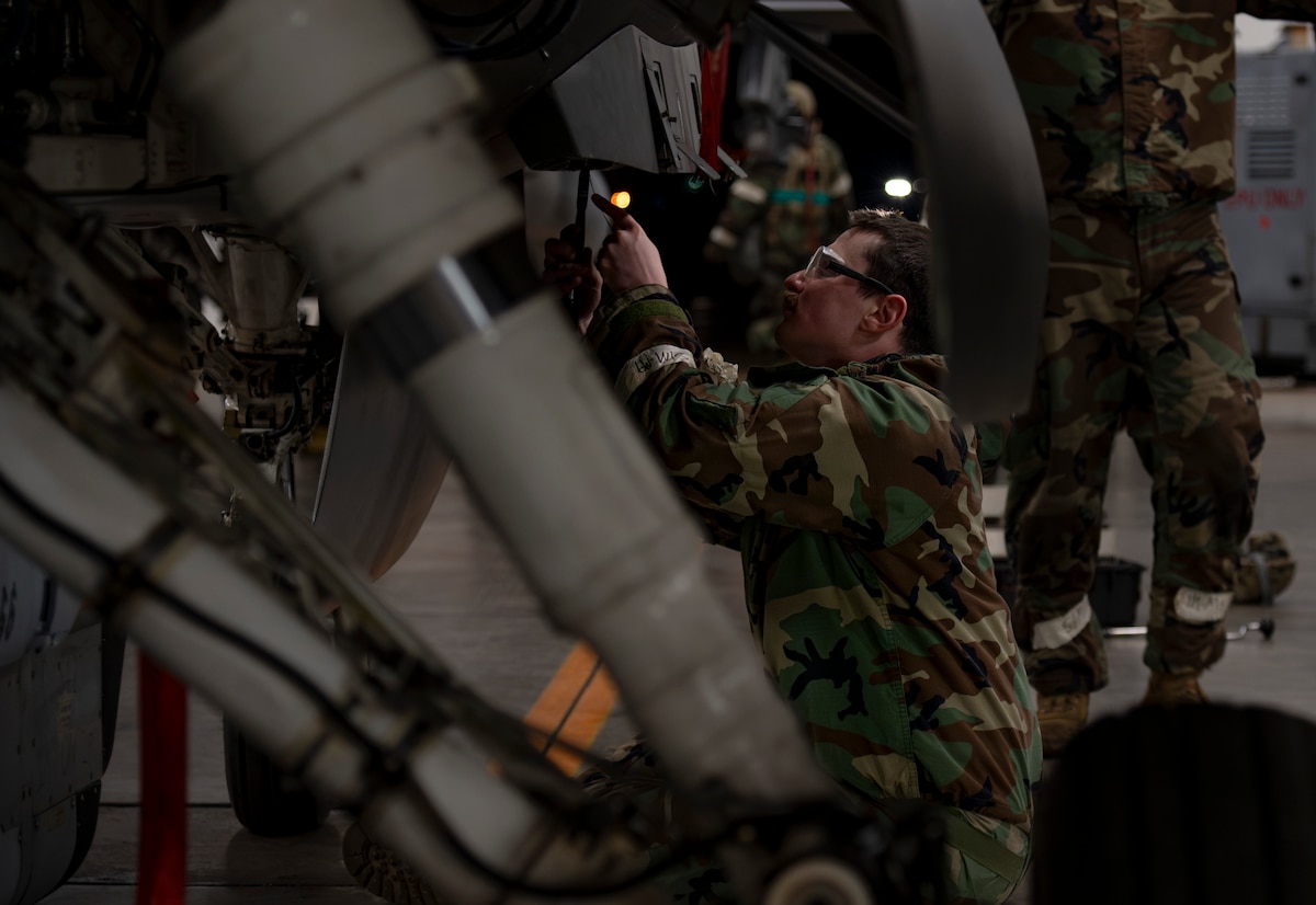 A U.S. Air Force Airman assigned to the 14th Fighter Generations Squadron specialist flight prepares a U.S. Air Force F-16 Fighting Falcon for a pod installation during Beverly Sunrise 25-03 at Misawa Air Base, Japan, March 20, 2025. Exercises like Beverly Sunrise demonstrate the 35th Fighter Wing’s capability to project airpower at a moment’s notice, ensuring its jets are always ready to dominate the skies and maintain mission readiness. (U.S. Air Force photo by Senior Airman Brittany Russell)