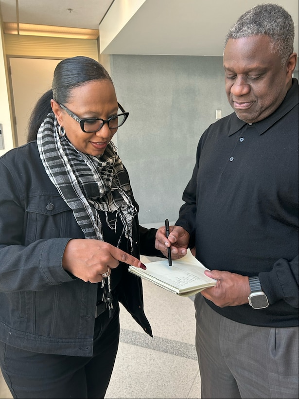 Angela Jones talks to another supervisor